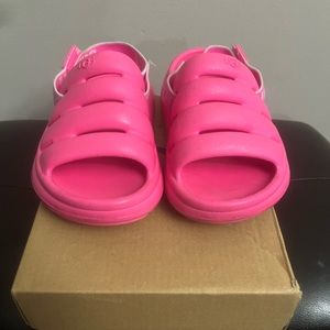 Pink UGG slide ( toddler size 9 ).